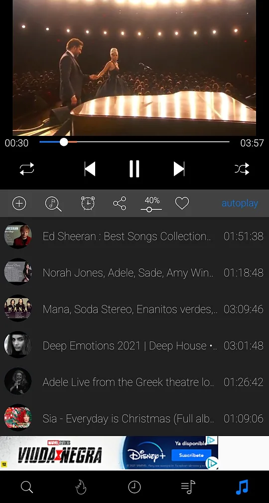 iTube music player showing the playback queue, autoplay, volume and favorite buttons